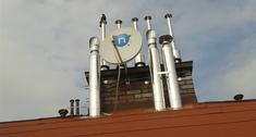 Wstawiać czy nie parasol nad kominem spalinowym? Czyszczenie przewodów kominowych - kiedy i jak?